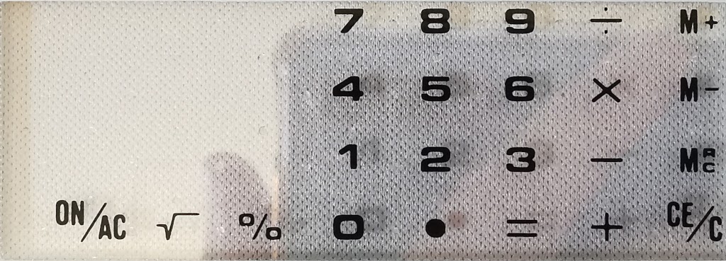 Closeup of the keypad on the generic transparent calculator