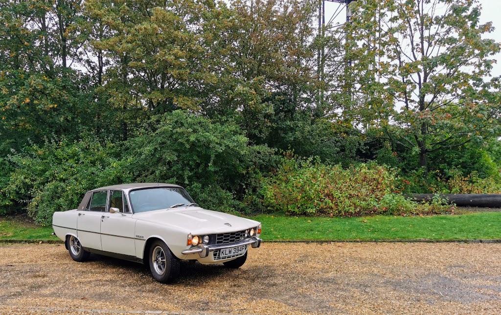 Wider angle front right profile view of a 1975 Rover P6B 3500
