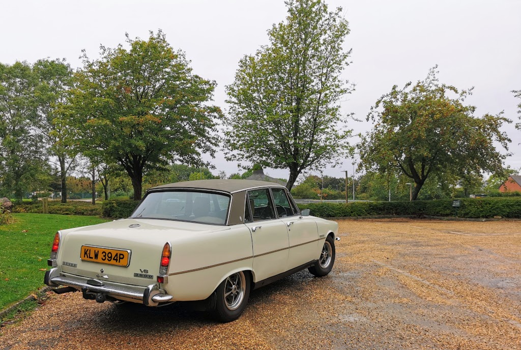 Wider angle rear right profile view of a 1975 Rover P6B 3500