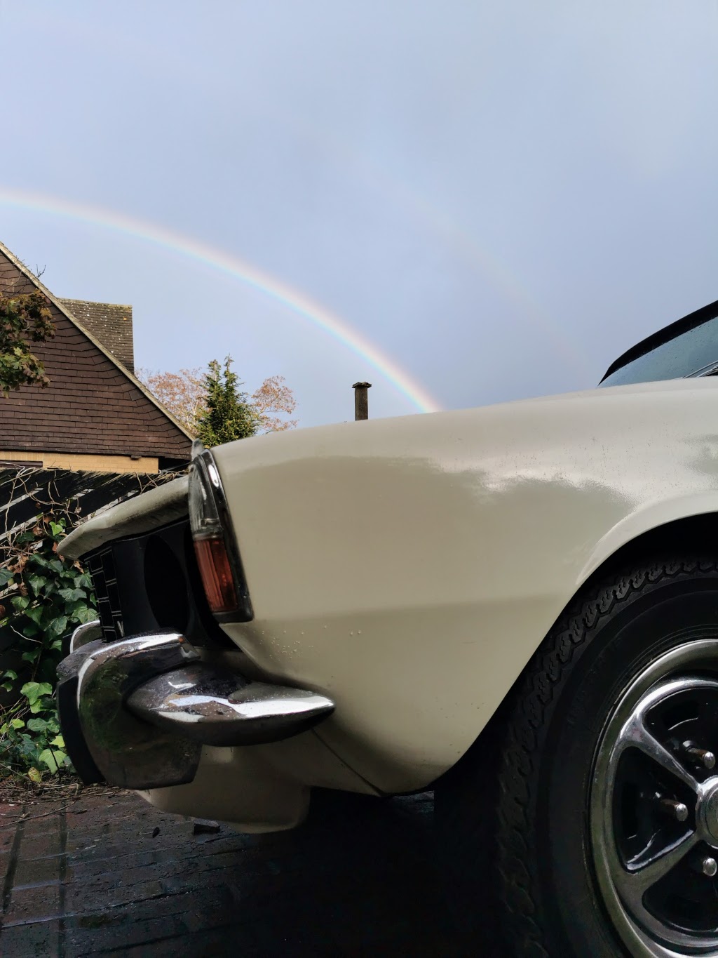 1975 Rover P6 3500 in front of rainbow