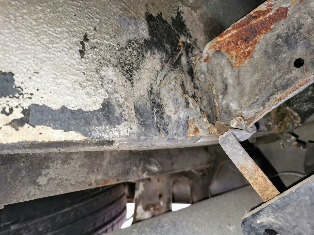 Clear evidence of prior repairs to the rear of the rear wheel arches and boot floor