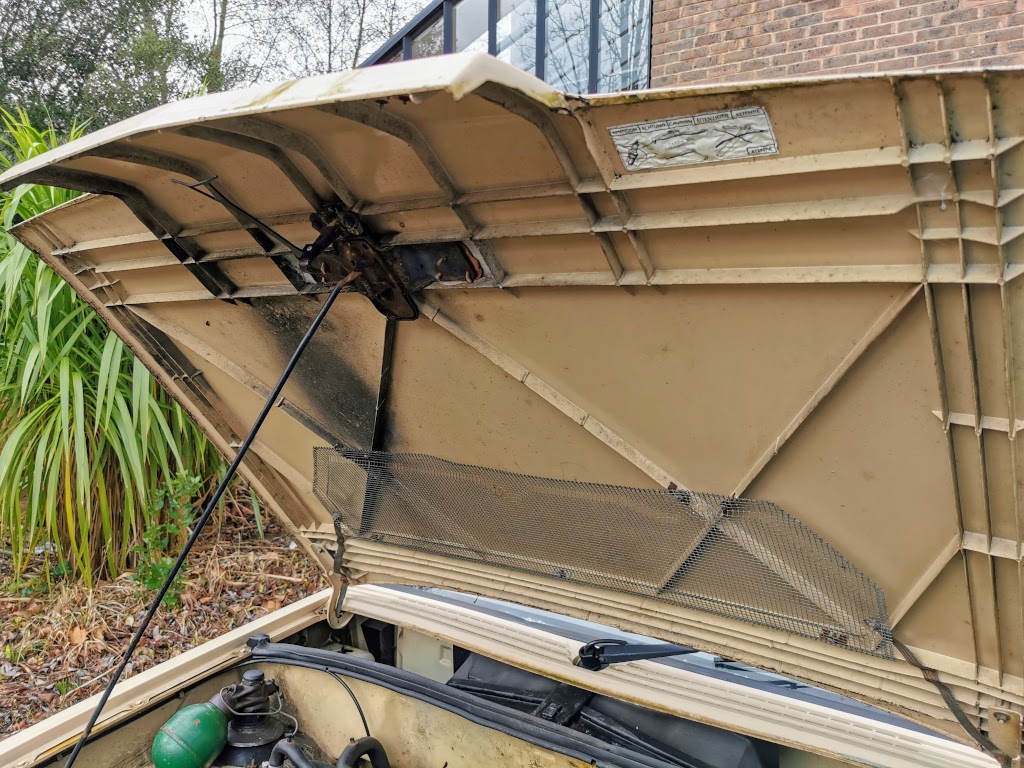 Detail of underside of bonnet of 1983 Citroen BX 14RE, showing RF shielding grid towards rear