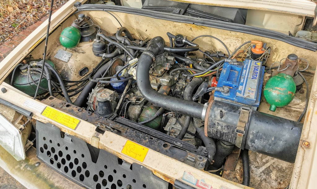 Engine bay of 1983 Citroen BX 14RE before any work was undertaken