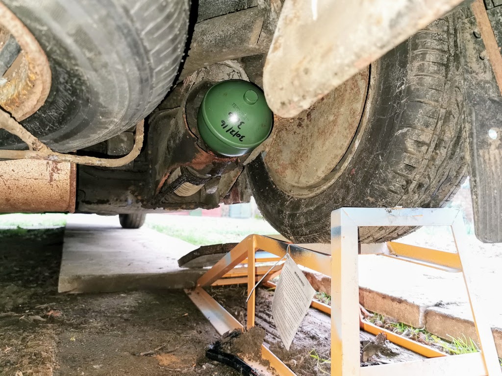 New sphere fitted to the offside rear suspension strut