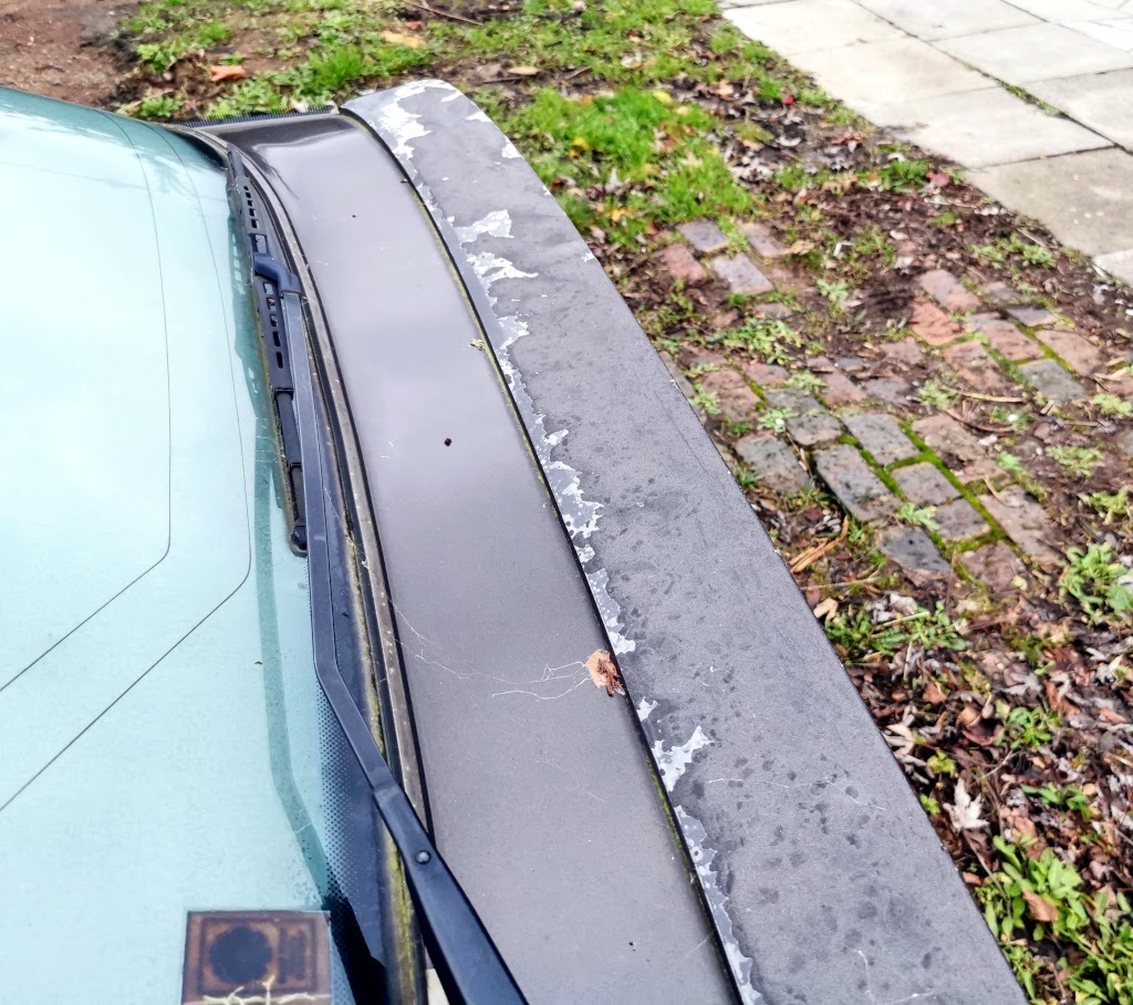 Clearcoat flaking badly on the spoiler, the bootlid itself seems okay though