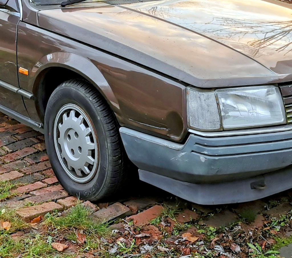 Dent in the offside front wing