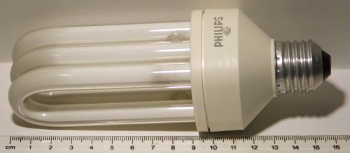 Philips PL E-T Pro 23W Warm White E27 Compact Fluorescent Lamp - Shown adjacent to ruler to show scale of lamp