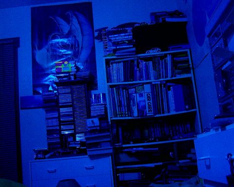 Pro-Lite SCR-18 Blue Coloured Compact Fluorescent Lamp illuminating a wall in my room from approximately three metres
