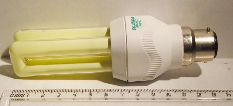 Sylvania Mini-Lynx Pastel 11W Apricot Compact Fluorescent Lamp - Displayed next to ruler to show length of lamp