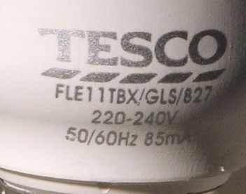 Tesco FLE11TBX-XM-GLS-827-B22-TESCO/1 Compact Fluorescent Lamp - Detail of text on lamp base (1/2)