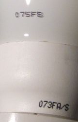 Tesco FLE11TBX-XM-GLS-827-B22-TESCO/1 Compact Fluorescent Lamp - Detail of text printed on lamp base (2/2)