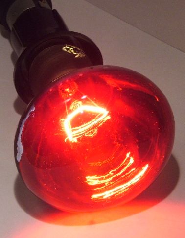 Crompton R6080RES 60W R80 Style Red Coloured Reflector Lamp - Lamp shown while alight