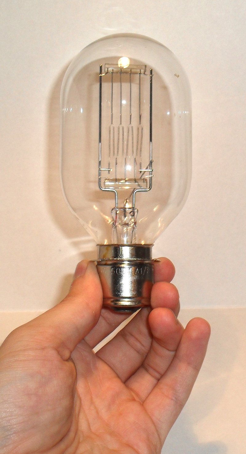 Thorn A1/8 240V 500W P283/25 Projector Lamp - held in hand to show relative scale