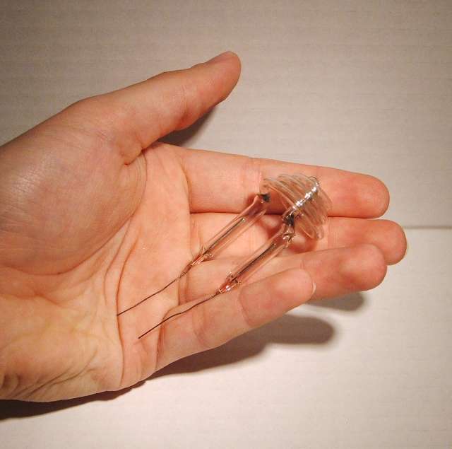 Miniature Wire-Ended Neon Spiral Lamp - Shown held in hand to give relative scale