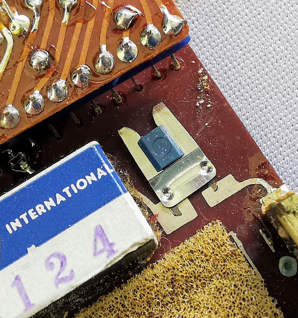 Detail of PCB mounted power slider switch on a Prinztronic Mini 7 Calculator