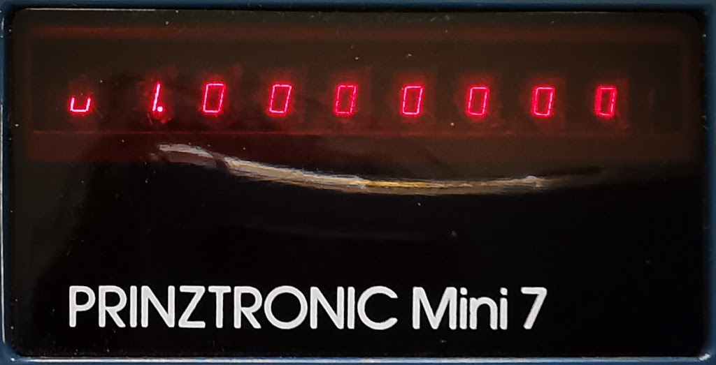 Detail of the display on a Prinztronic Mini 7 Calculator showing an overflow