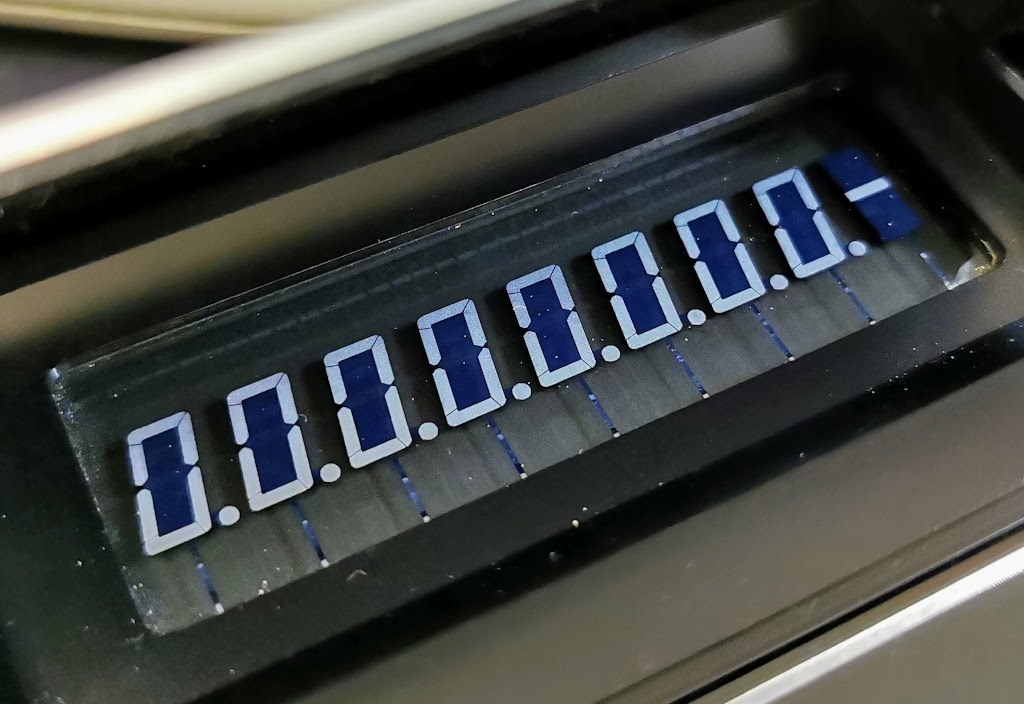 Sharp EL-808 Calculator showing an underflow error.  Calculator remains locked until cleared with the C key.