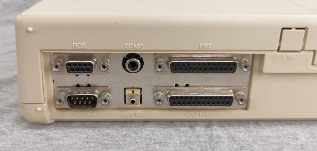 Detailed look at the rear system ports on a Toshiba T1200
