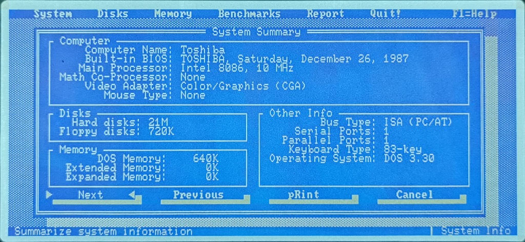 Toshiba T1200 showing CheckIT summary screen on LCD display
